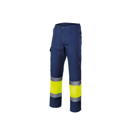 PANTALON BICOLOR MULTIBOLSILLOS ALTA VISIBILIDAD ENTRE CINTAS REFLEX. 65% POL. 35% ALG. VELILLA